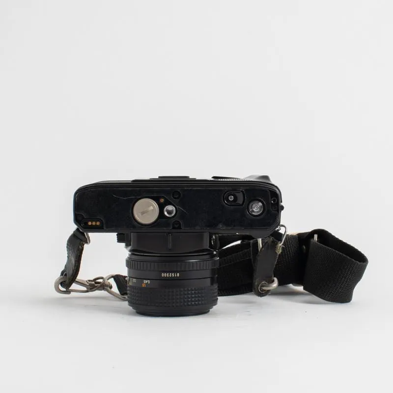 Minolta X-700 MPS with  a 50mm f/1.4 and 28-200mm f/3.5-5.3 Lenses
